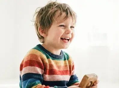 Child receiving a pediatric eye exam at Greenwich Ophthalmology Associates